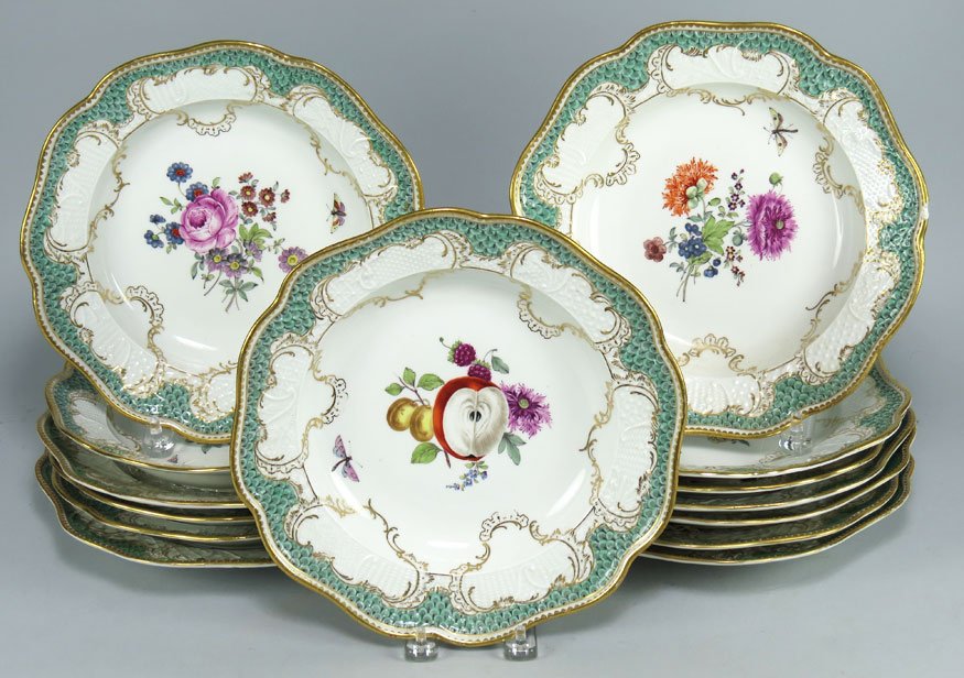 (on 14) GROUP OF MEISSEN PLATES: blue cross sword mark, ruffled edge with border of gilt saw tooth and aqua-green shaped and imbricated banding, centers with hand-painted floral sprays and flying insects, (6) soup plates, 10”; and
