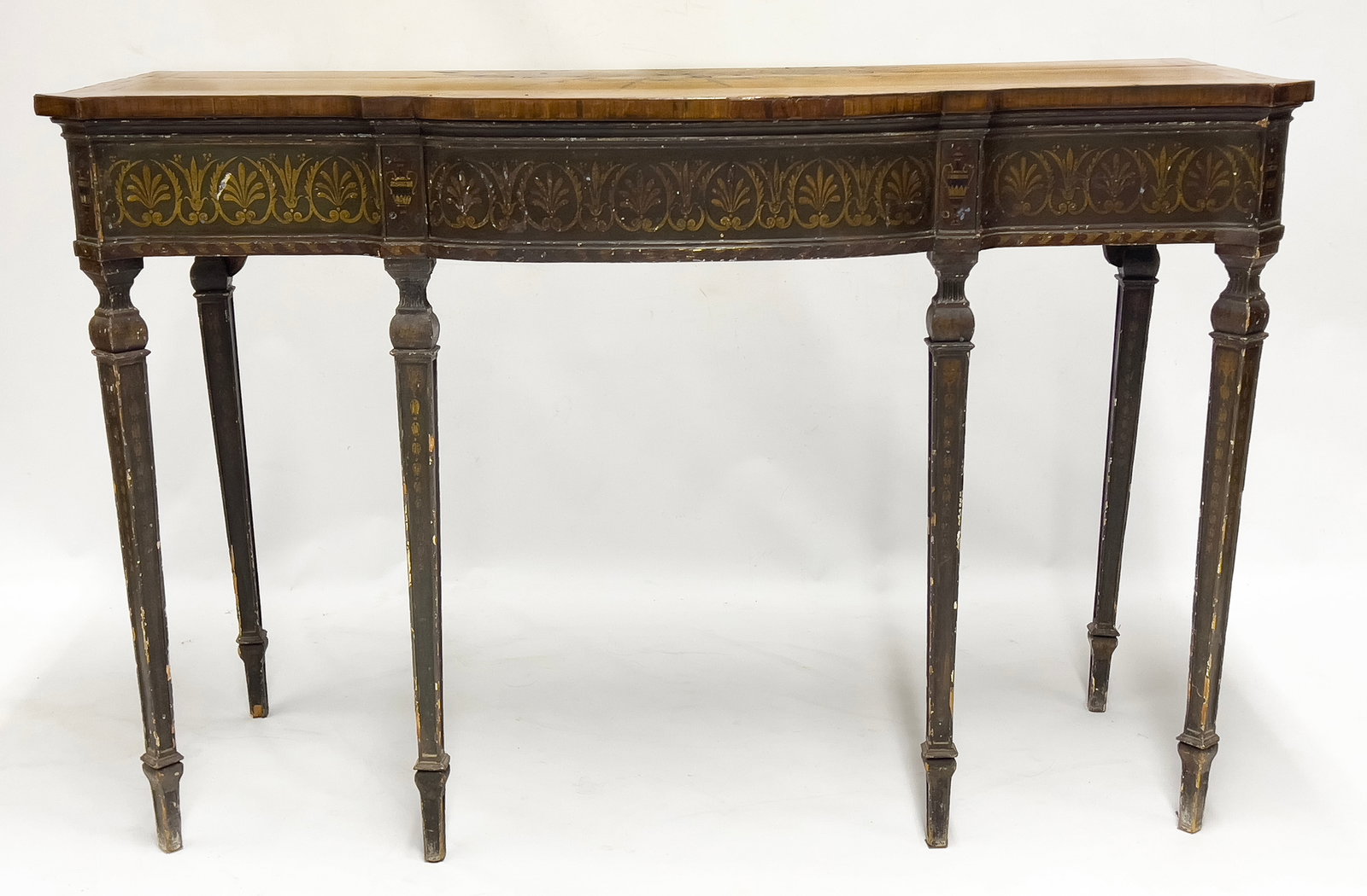 ENGLISH GEORGE III INLAID CONSOLE TABLE: c. 1790, shaped satinwood top with half round inlaid fan design and inlaid floral and bud edging ; the base with original green paint and parcel gilt decorative enhancements to sides and legs; tall ta