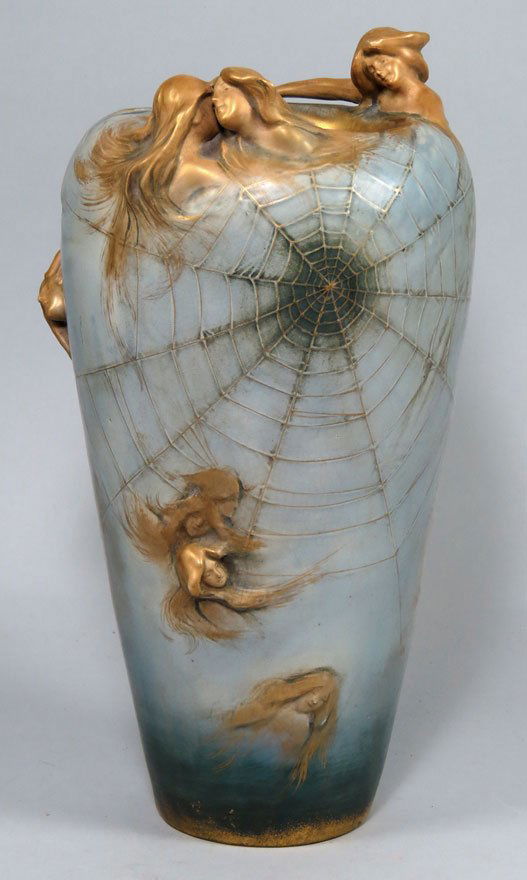 ART NOUVEAU POTTERY VASE, AMPHORA: bottom with raised profile mark, AMPHORA; also incised 3744 42 also red mark...TEPLITZ.RSK...Made in Austria reverse tapered form, pale blue glaze with gilt female figures raising from surface at rim