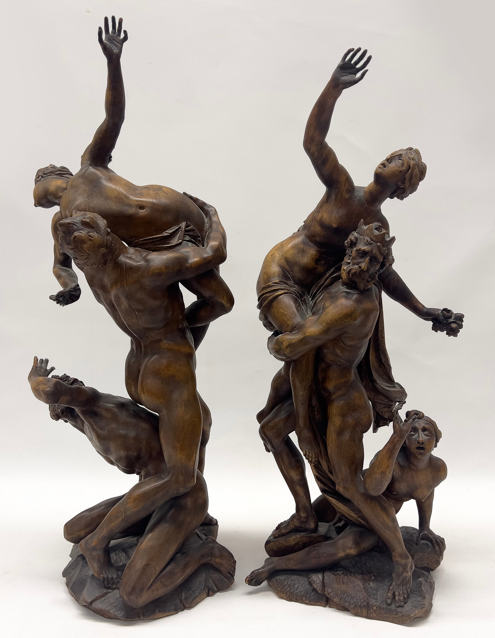 PAIR OF ITALIAN CARVED WALNUT MYTHOLOGICAL FIGURAL GROUPS : 18/19th c., depicting Roman legends, the abduction of a Sabine woman, 24"h (woman has two fingers missing); the other, Pluto abducting Proserpina; 22.5"h (Ceres, the mother, on ground, has finger miss