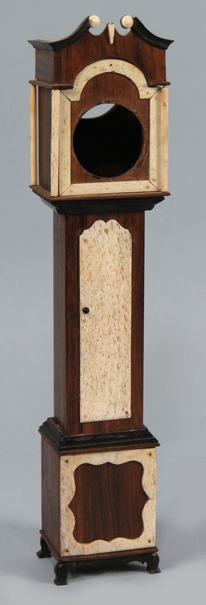 SAILOR’S EBONY AND WHALE BONE WATCH HUTCH: c. 1840, Chippendale tall clock-form with pocket watch window in bonnet, 13”h