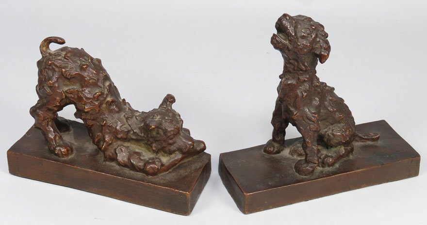 BRONZE TERRIER BOOKENDS, E. B. PARSONS : Edith Barretto Parsons (Am., 1878-1956) one in sit position, the other in downward-facing dog position both bases incised: Kunst Bronze Foundry N.Y., E. B. Parsons © bases measure 7” by 2.75”