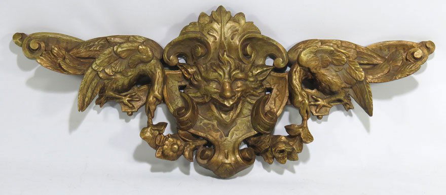 LARGE ITALIAN ARCHITECTURAL CARVING: 18/19th c., carved grotesque masque flanked by swans, 20”h; 49.5”w