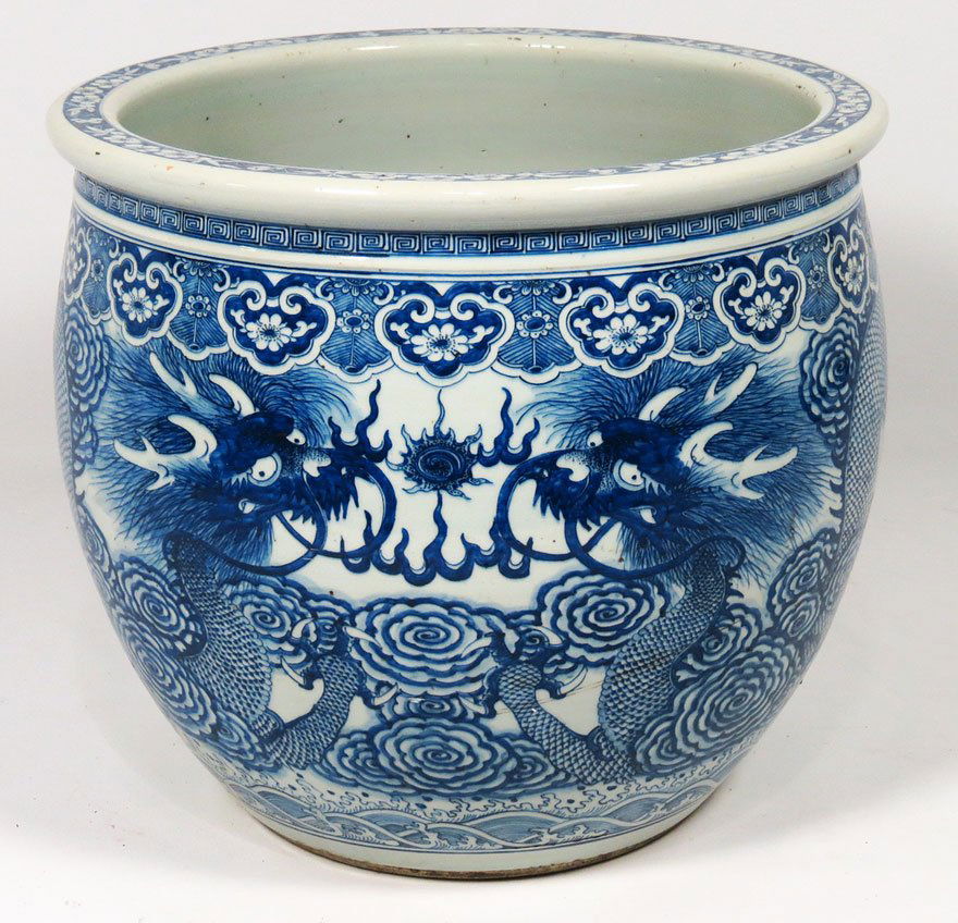 CHINESE BLUE AND WHITE PORCELAIN FISH BOWL: with double dragon design, 17.5”h; 20”diam. Part of the original lavish decorations of Boston’s Keith Memorial Theatre at 539 Washington St., later sold to become RKO-Keith Theatre. Descended th