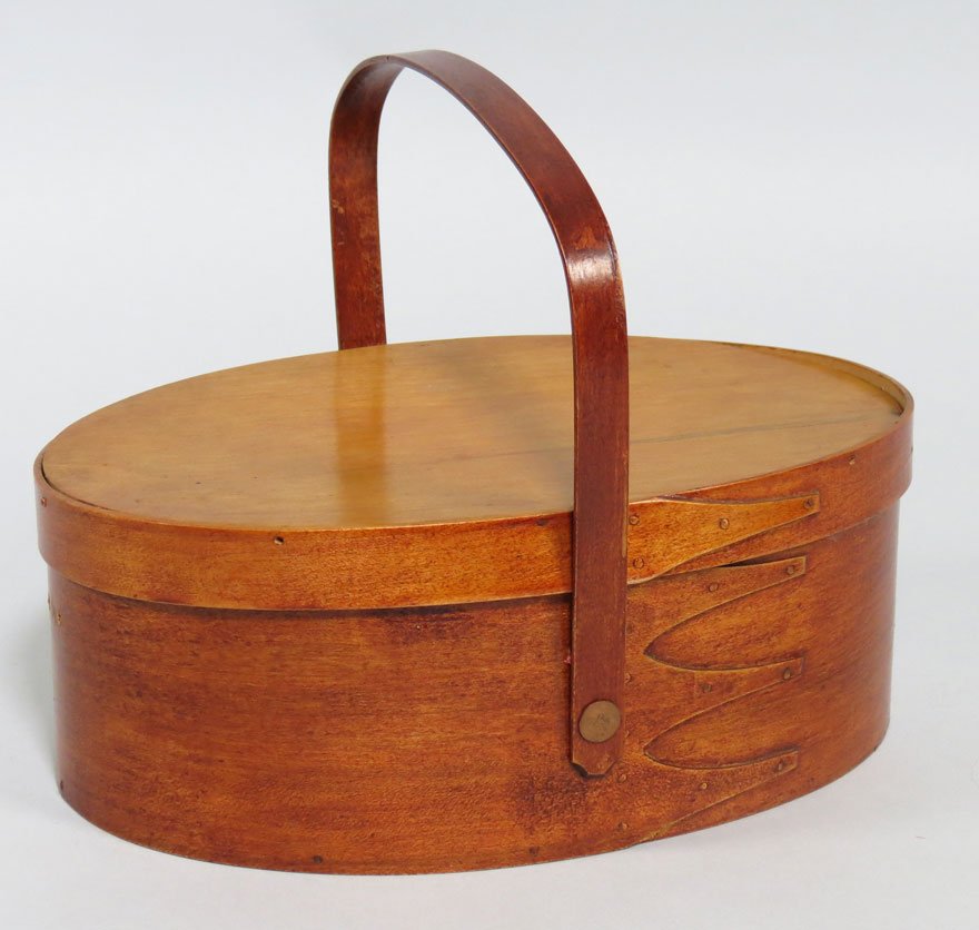 SHAKER OVAL SEWING BASKET: three fingers with swing handle, silk lined interior, with various Shaker sewing implements handwritted Christmas greeting reads: These are Shaker work boxes which I bought at the Shaker Village in Le