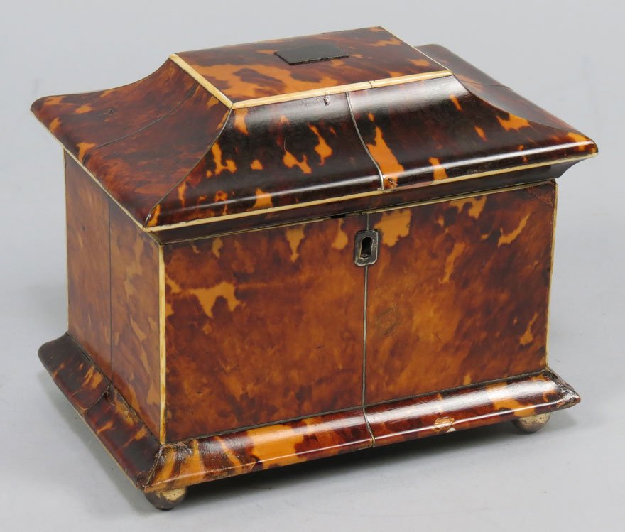 ENGLISH GEORGIAN TORTOISE SHELL TEA CADDY: rectangular-form, double compartments with tortoise lids, ball feet, 5”h; 6.5”w; 4.5”d