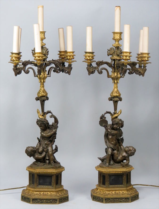 PAIR OF FRENCH FIGURAL BRONZE 6-LIGHT CANDELABRA: 19th c., each with a pair of playful putti, a lizard climbing up column supporting five candle arms with central raised light with applied long-eared squirrels, mounted on stepped rectangular base, 26