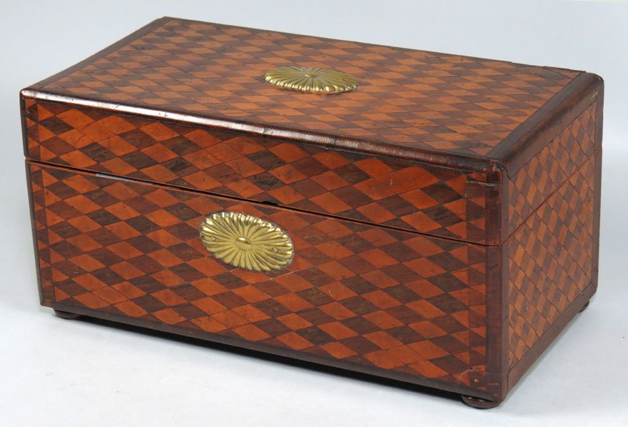 19TH C. PARQUETRY INLAID VALUABLES BOX: oval brass mount to hinged lid and front, suppressed bun feet, 6.5”h; 13”w; 7”d