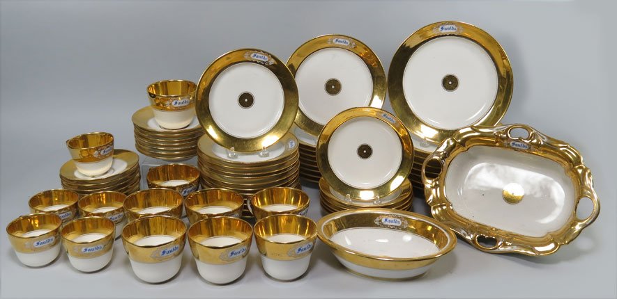 (on 64) PARIS PORCELAIN PART DINNER SERVICE, FAULDS: white porcelain with thick gold band gilding, bearing the name in blue Faulds in oval (8) DINNER PLATES, 9” diam.; and (9) LUNCHEON PLATES, 8” diam.; (12) SALAD PLATES, 7” diam.; (6) DESSERT PLA