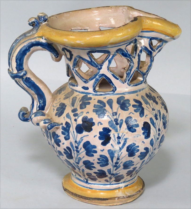 ITALIAN MAIOLICA PUZZLE JUG: overall blue floral decoration, 8"