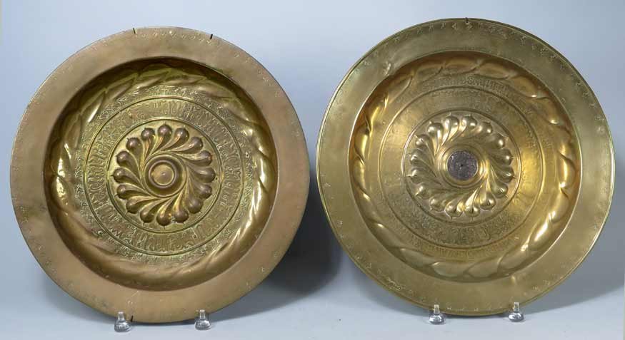 (2) FLEMISH or GERMAN BRASS ALMS PLATES: 17th c., central gadrooned roundels, both with band of Gothic script and punch decoration, each 16"diam.