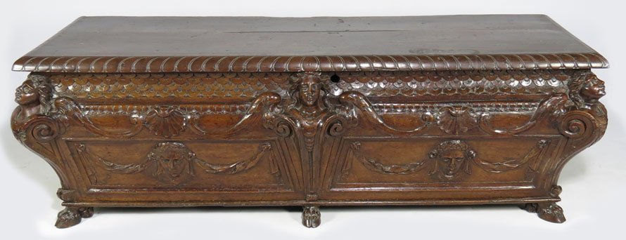 RENAISSANCE CARVED WALNUT CASSONE: winged female caryatids to angles, front with carved caryatid to center, flanked by swag, shell and masque carving, hoof feet, 22"h; 66"w; 22"d