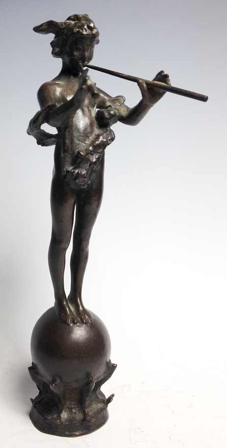 FREDERICK WILLIAM MACMONNIES (American, 1863-1937): Pan of Rohallion sgn. and dated F.MacMonnies 1890 inscribed on base below globe, TO PAN OF ROH ALLION...ANNO M..... cast bronze (brown), inscribed 65 inside, 10” This is a smaller copy of a life-siz