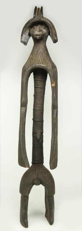 MUMUYE IAGALAGANA FEMALE FIGURE: Nigeria, carved wood, the core wrapped in reed strips, 31” Prov.: The David Abbate (1949-2013) Collection