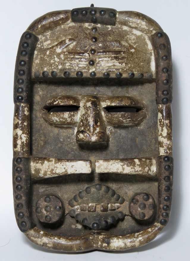 BETE MASK: Ivory Coast, wood, nails and pigment, 12” 7”w Prov.: The David Abbate (1949-2013) Collection