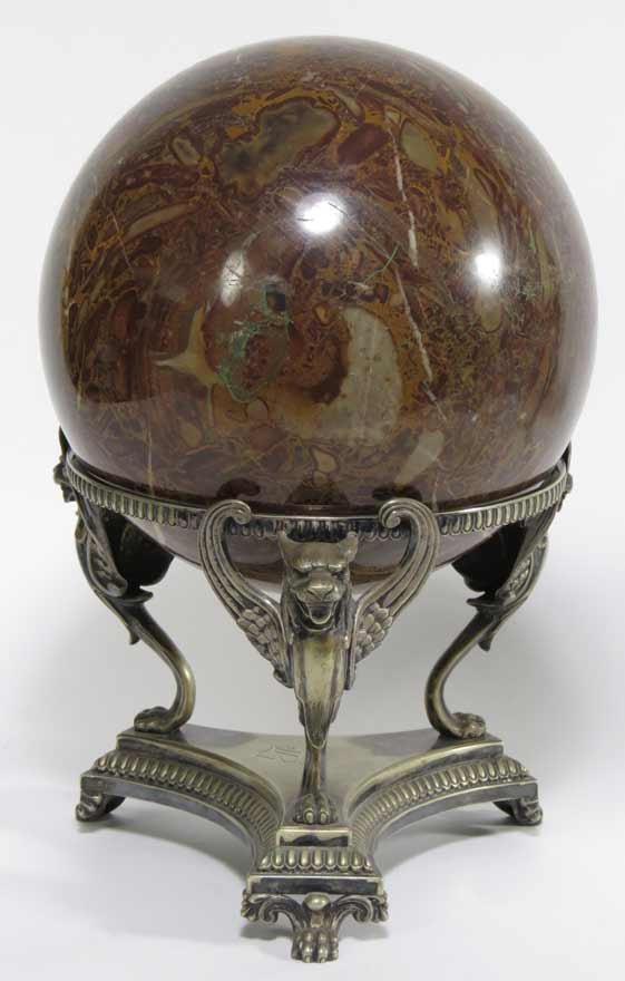 LARGE STONE ORB ON STAND: approx. 8” diam., set in silver plated stand with three griffin supports, 12” total h Ex. Kurt Reynolds collection, Boston