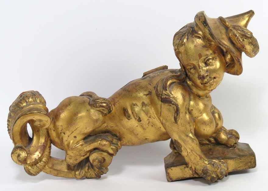 ITALIAN CARVED GILTWOOD FIGURAL FRAGMENT: 18/19th c., mythological creature wearing a feathered hat, 9”h; 14.5”w Ex. Kurt Reynolds collection, Boston