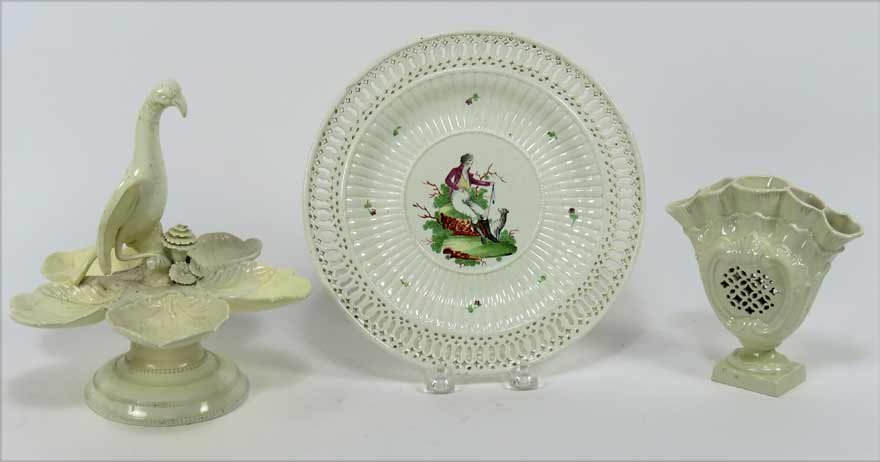 (on 3) CREAMWARE FOOTED CONDIMENT DISH: the handle being a bird perched on flowering twig above five shallow leaf-form bowls, round footed base with beaded banding, 8.5”h (neck of footed base restored); along with a CREAMWARE VASE footed
