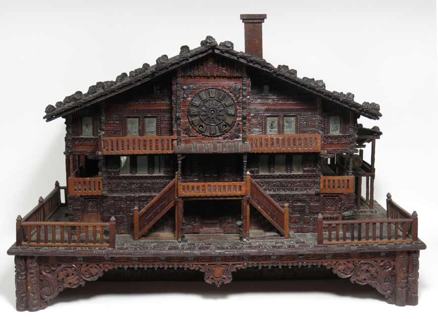 LARGE BLACK FOREST WOOD CHALET: 19th c., originally housed a music box and clock, now sans works, 23.5”h; 32”w; 15.5”d