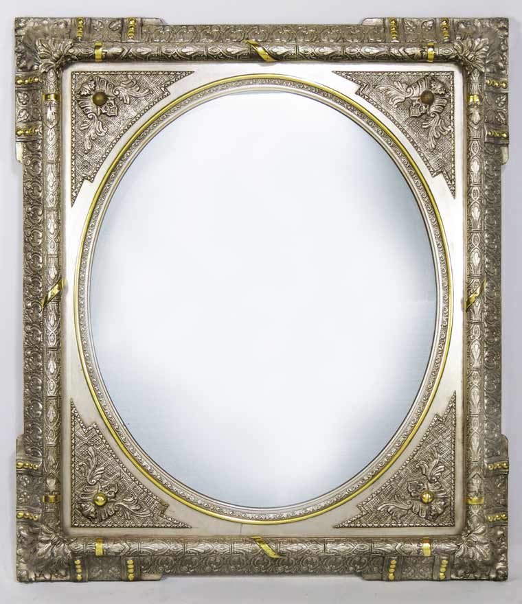 CARVED AND PAINTED MANTEL MIRROR: antique ornate aesthetic frame, well painted with silver paint and gold embellishments, rectangular with round looking glass, 40.5” by 35” Ex. Kurt Reynolds collection, Boston