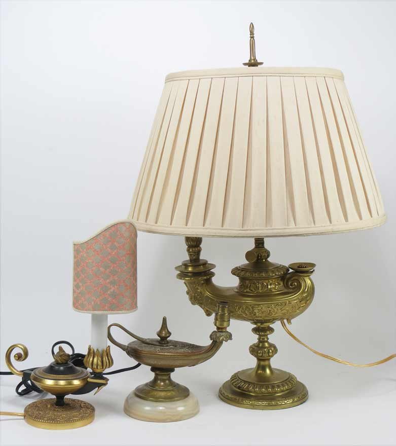 (3) METAL ALADDIN LAMPS: brass and bronze, one large with custom silk shade, 22”h; 9”w; along with two small lamps Ex. Kurt Reynolds collection, Boston