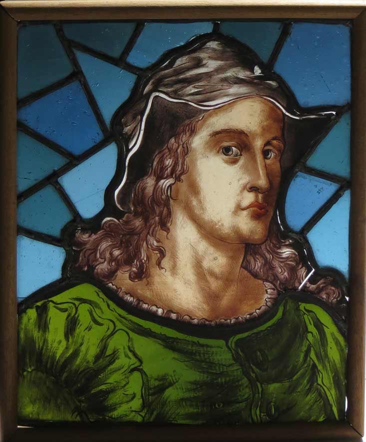 SMALL LEADED AND PAINTED GLASS PANEL: head of man, 12” by 10.5”, framed to hold together Ex. Kurt Reynolds collection, Boston