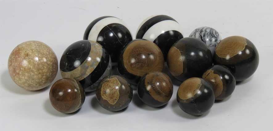 (13) STONE BALLS: various sizes, most match the stone eggs in lot 130 Ex. Kurt Reynolds collection, Boston