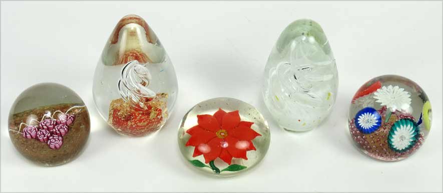 (5) 20TH C. GLASS PAPERWEIGHTS: two egg-shaped Murano paperweights with swirl decoration; three floral, one being a red poinsettia Ex. Kurt Reynolds collection, Boston