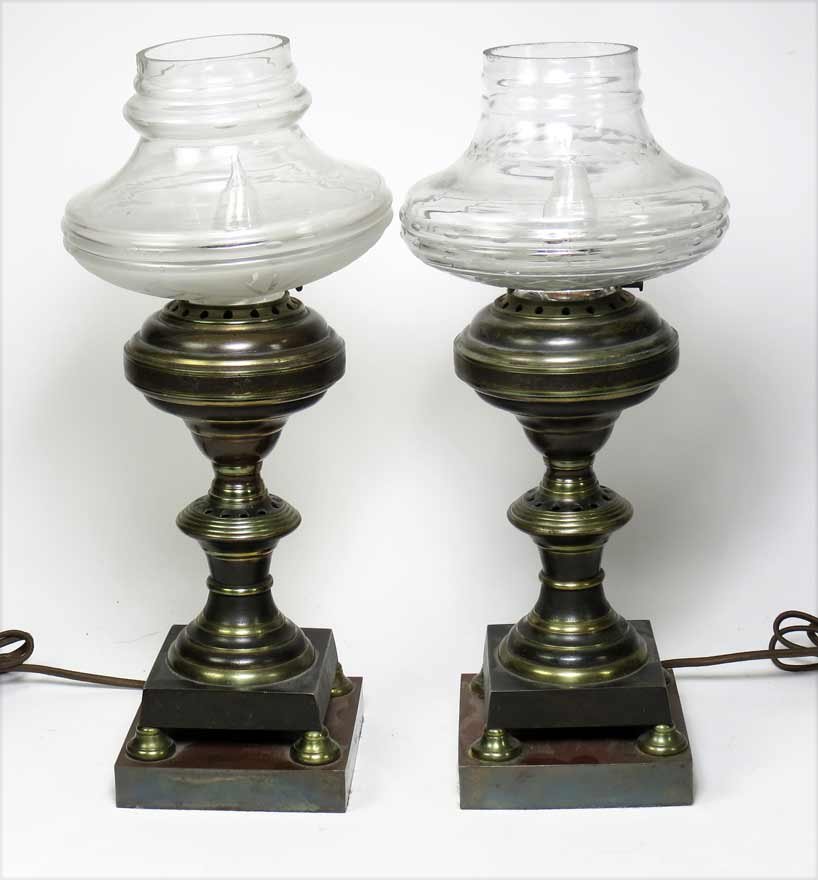 PAIR OF METAL LAMPS WITH GLASS SHADES: oil-lamp form, 16”h Ex. Kurt Reynolds collection, Boston