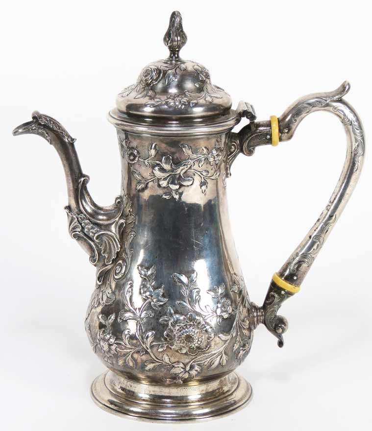 18TH C. ENGLISH SILVER COFFEE POT: makers: Thomas Whipham & Charles Wright, 1762 footed with chased floral and scrolling leaf decoration, hallmarks on body below the hinged lid, 12”h; 41.5 troy oz.
