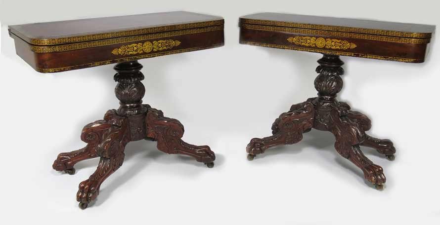 PAIR OF NEW YORK CLASSICAL STENCILED MAHOGANY CARD: c. 1825 swivel rectangular top with original gilt stenciled borders, classical gilt faux ormolu stencil to apron, leaf carved post with four heavily carved legs ending in paw feet, on casters, 30”h;