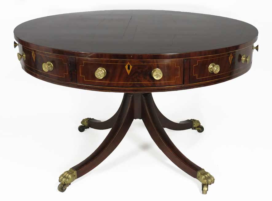 ENGLISH GEORGIAN INLAID MAHOGANY DRUM TABLE: late 18th c., four working and four false apron drawers with brass knobs and inlaid escutcheons, on pedestal base with four in-curving reeded legs ending in brass paw feet with casters, 29.5”h; 48��