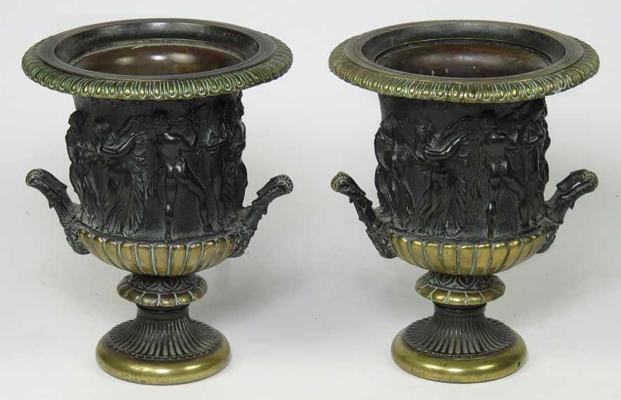 PAIR OF FRENCH CLASSICAL BRONZE GARNITURES: first quarter19th c., urn-form, with relief bacchanalian figures, modeled after the Medici and Borghese urns, 7.75”h; 6.25”diam.