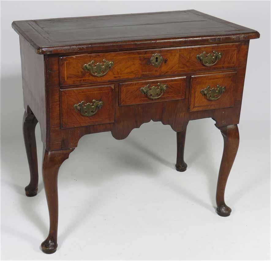 ENGLISH INLAID WALNUT-VENEERED LOWBOY: 18th c., brown tooled leather top, one drawer over three side-by-side drawers, original brass, 28”h; top 29.75”w; 18.25”d
