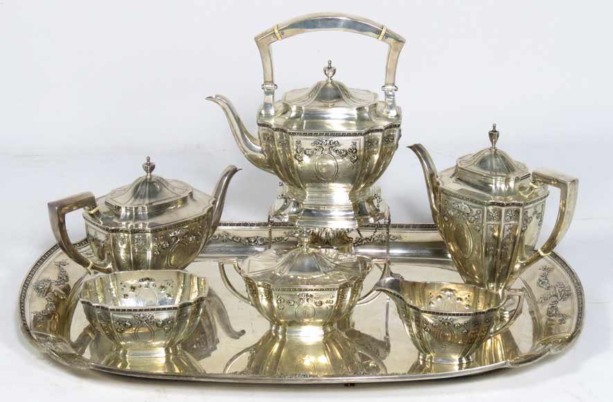 STERLING SILVER COFFEE AND TEA SERVICE, ON TRAY: Mount Vernon hallmark, marked STERLING six-pieces consisting of a kettle on paw-foot stand with sterling burner, a footed teapot, a coffee pot, a covered sugar, a creamer, and a waste bowl all with ch