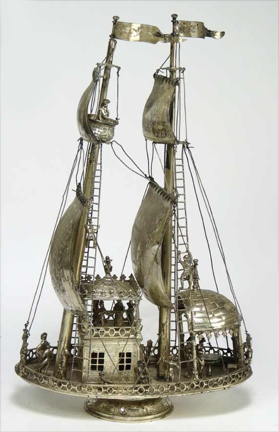 GERMAN 800 SILVER GALLEON: c. 1900, bearing multiple hallmarks on sail and throughout two-masted ship with unfurled sails, twenty figures aboard at various tasks, 16”h; 9.5”w; 4.5”d; 41.5 troy oz.