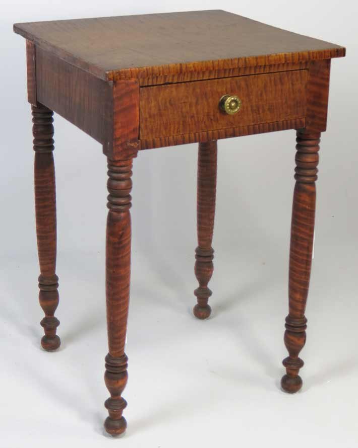 NEW ENGLAND SHERATON BOLD TIGER MAPLE STAND: c. 1830, on drawer with original brass, block and ring turned legs, 27.5”h; 17”w; 17”d