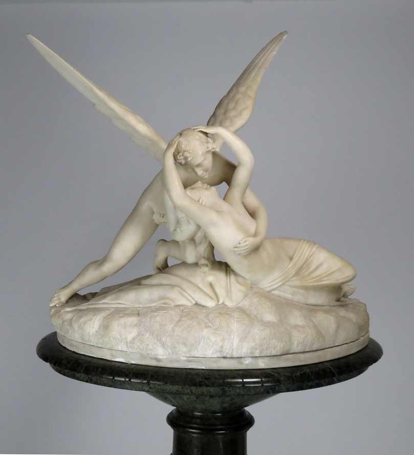 MARBLE GROUP, PSYCHE AND CUPID, ON MARBLE PEDESTAL: 19th c., after Antonio Canova (1757-1822) sgn. on base, P. Bastianti..Florence white marble of Psyche revived by Cupid’s kiss, 22”h; 23” at base on original conforming green marble, 3-part, colu