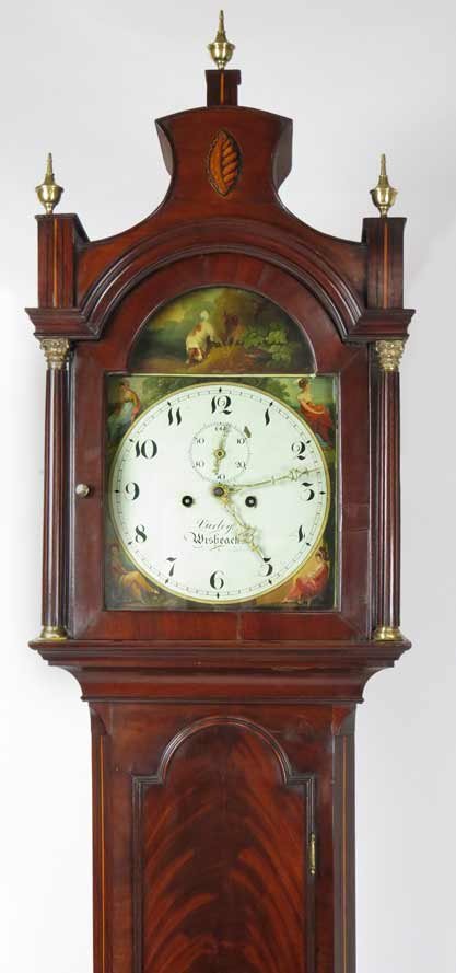 ENGLISH GEORGE III INLAID MAHOGANY TALL CLOCK: sgn. Vurley Wisbeak, oval shell inlay to bonnet, painted dial with seated woman in each corner, dogs above, 8-day brass works, back of face stamped W&H, also WALKER, 88”tall