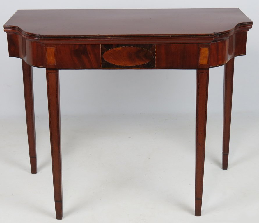 NEW ENGLAND HEPPLEWHITE MAHOGANY CARD TABLE: D-form with reverse scroll corners, square tapering legs, 29”h; 36”w; 17”d