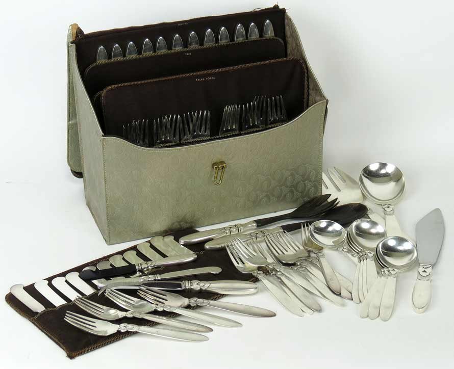GEORG JENSEN STERLING FLATWARE SERVICE: Cactus pattern, 105 pieces total designed by Gundorph Albertus in 1930 (24) teaspoons; (18) dinner forks; (12) of each: dessert forks, salad forks, dinner knives, butter spreaders; (8) soup spoons; an