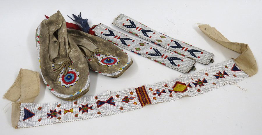 (on 4) PAIR OF PLAINS BEADED HIDE MOCCASINS (1 of 2)