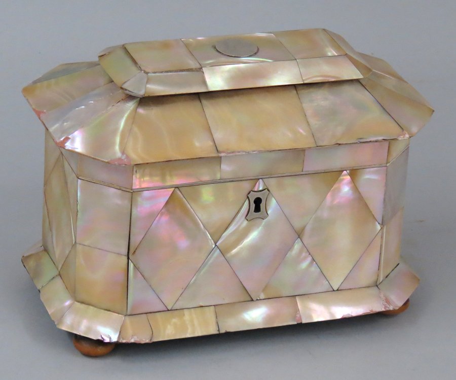 REGENCY MOTHER-OF-PEARL TEA CADDY: rectangular-form with canted corners, double compartments with mother-of-pearl lids, silver escutcheon, 5.5”h; 7.75”w; 4.75”d