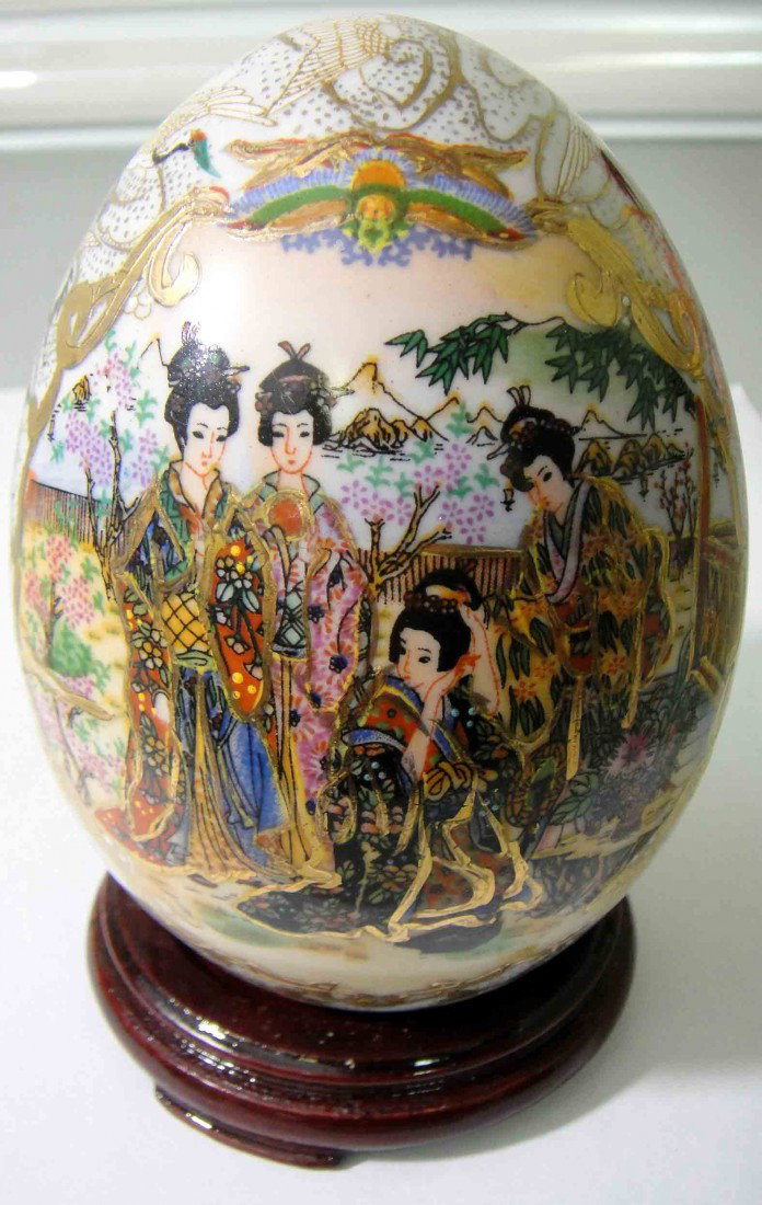 Chinese Porcelain Egg with Wooden Stand: Chinese Porcelain Egg with Wooden Stand. size: 6" Tall