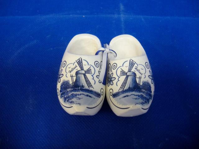 PAIR OF SMALL SHOES WITH WINDMILL MADE FROM SAW DUS: PAIR OF SMALL SHOES WITH WINDMILL MADE FROM SAW DUST