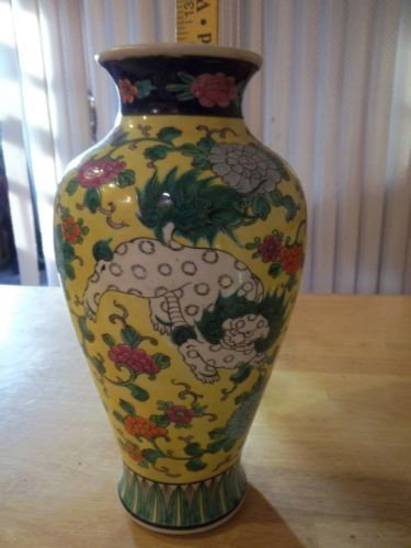 Vintage Chinese colourful Art Deco vase: Vintage Art Deco antique item, circa 1940's Large and colourful vase decorated with 2Foo (Fu) Dogs/Chinese Guardian Lions on it every thing on the vase is ingraved and hand painted 13in high and 6in a