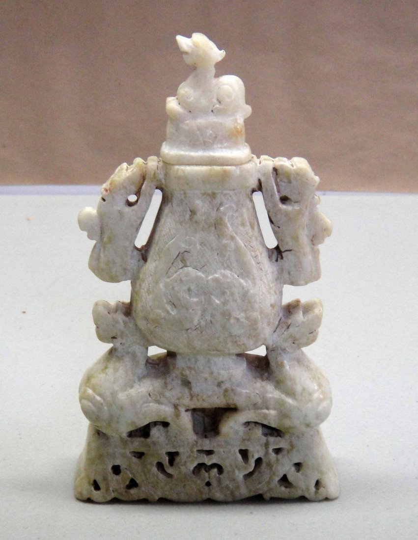 Hardstone Vessel Bottle w/ Qilin Hands Carved/Etched: 20th Century; Vintage hand carved and etched Hard stone vessel with Qilin Hands and Suer. Jade-like Appearance. Approx. Size: 5.5" H x 3" W.