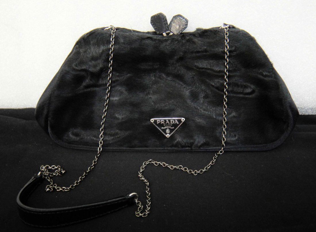 Authentic Prada Milano Black Pony Evening Bag: 100% Genuine Prada Milano Back Phone Evening bag. Made in Italy- Comes with a small Prada mirror.