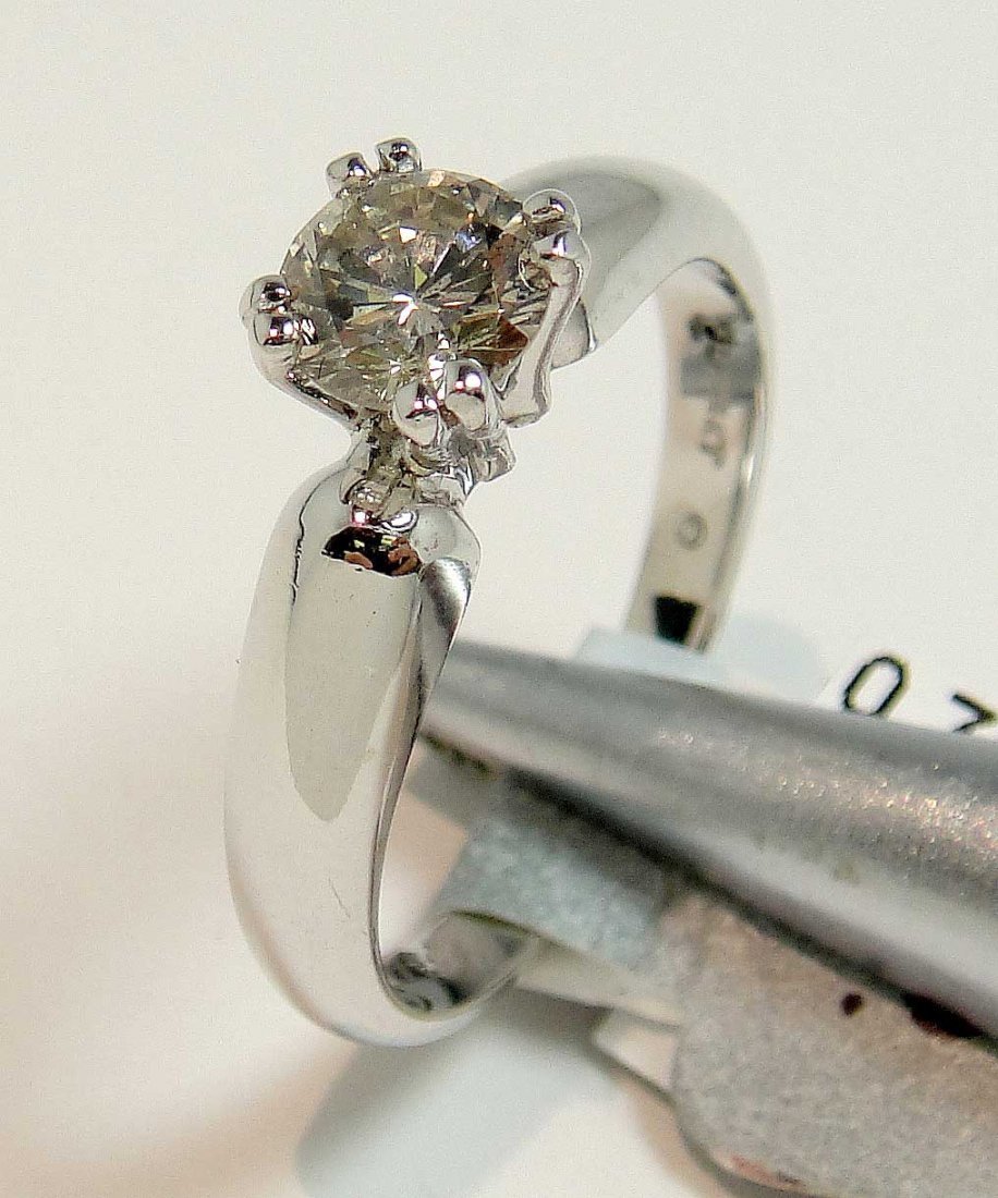 0.72ct Diamond14KT White Gold Solitaire Ring: Please review the attached gemologist report for further relevant information.