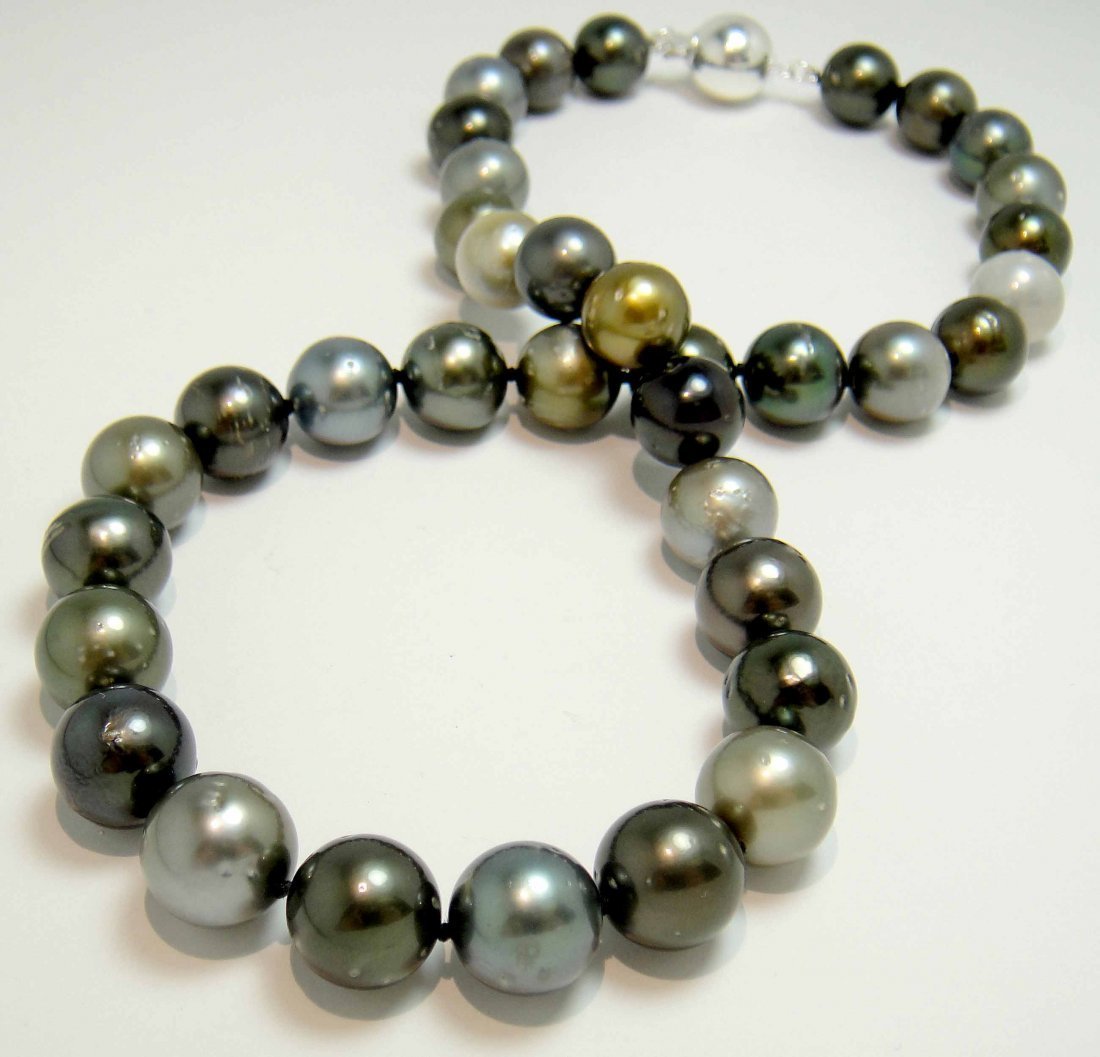 11.00-12.00mm Tahitian South Sea Cultured Pearl Ne: Please review the attached gemologist report for further relevant information.